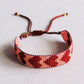 Bracelet tissé avec cœurs - bordeau / saumon - Bazou