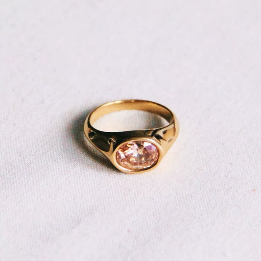 Bague avec pierre de cristal ovale - pêche - Bazou