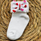 Paire de chaussettes bébé & nœuds création cœurs - J'adore Maman